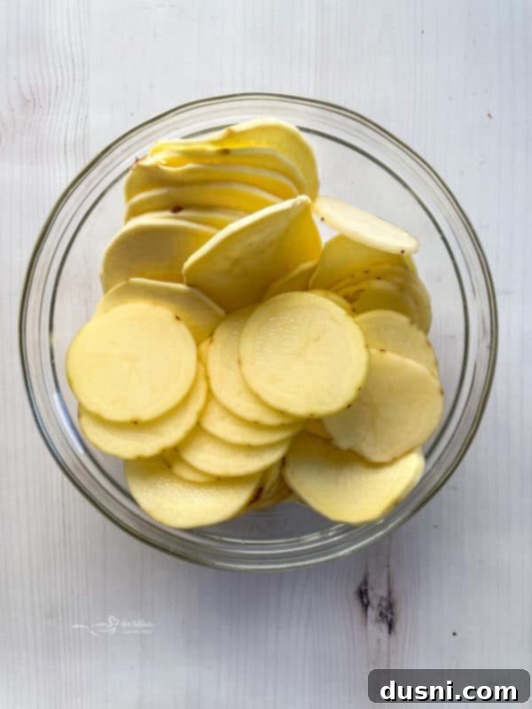 sliced potatoes in bowl