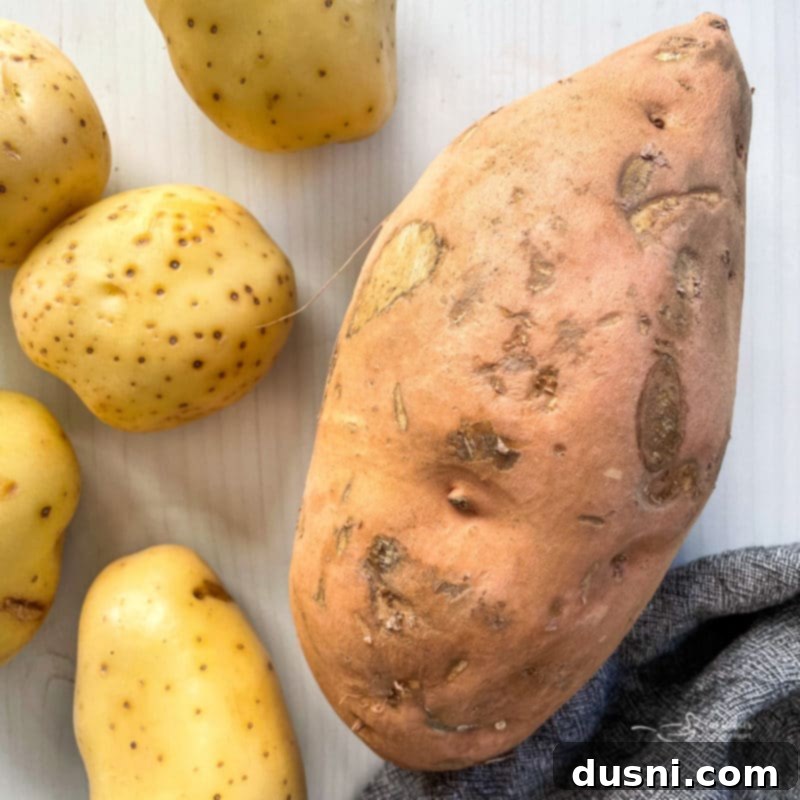 whole gold and sweet potatoes