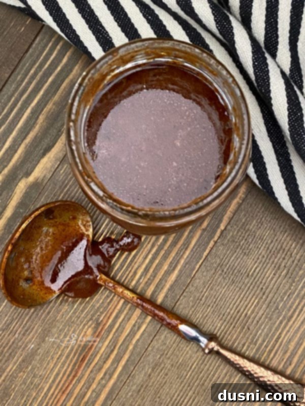 Enchilada sauce simmering in a saucepan