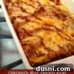 shredded beef enchiladas in a baking dish with text "shredded beeff enchiladas"