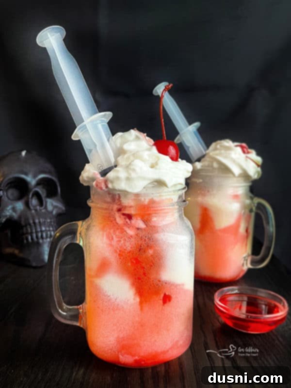 Rebel Shirley Float 2 Bloody Dirty Shirley Float with a cherry garnish and blood-filled syringe