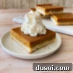 Pumpkin Pie Bars with Shortbread Crust close up with whipped cream