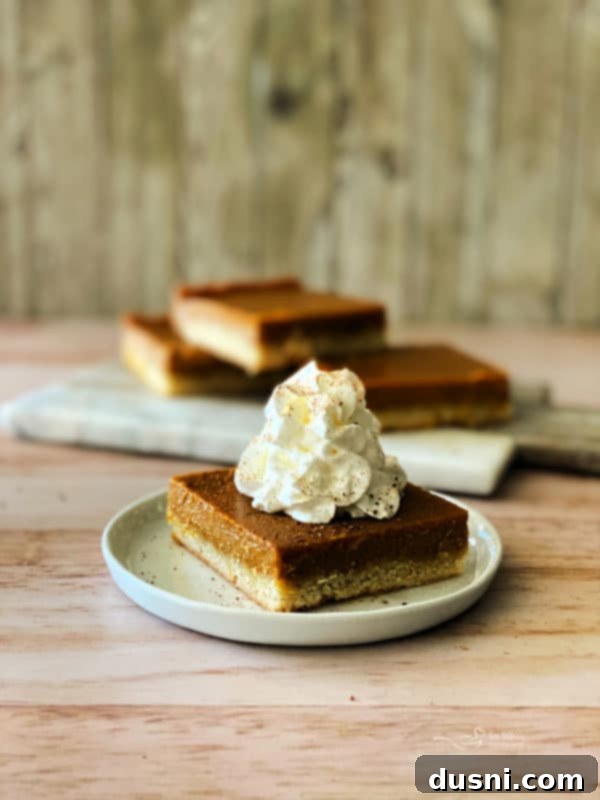 Pumpkin Pie Bars with Shortbread Crust, sliced and ready