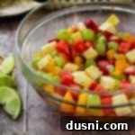 Margarita Fruit Salad in a clear bowl.