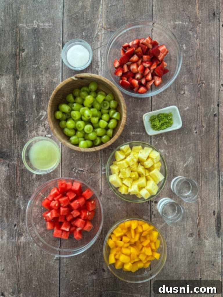 Close up of fresh fruits cut into chunks for the salad