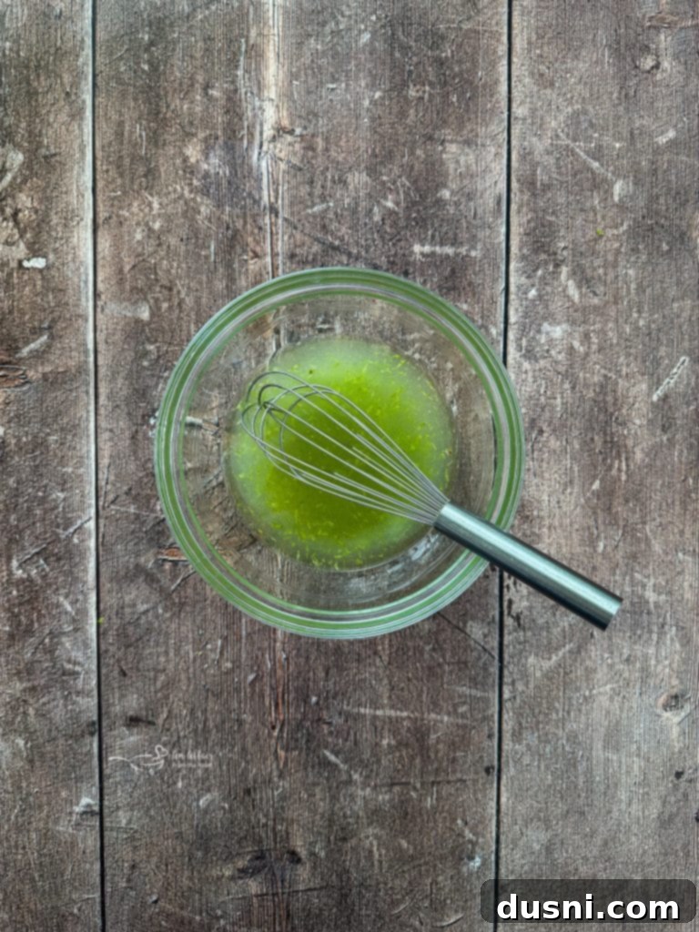 Mixing the ingredients for the margarita lime dressing