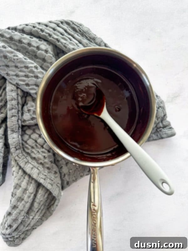 Velvet Espresso Chocolate Torte 10 Inverted chocolate espresso cake cooling on a wire rack.