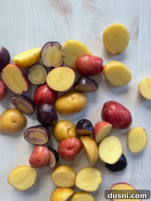 Cleaned and halved new potatoes, ready for cooking.