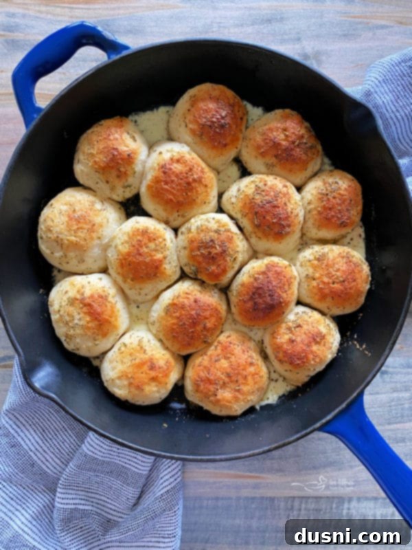 Italian Cheese Bombs brushed with garlic butter, ready for baking