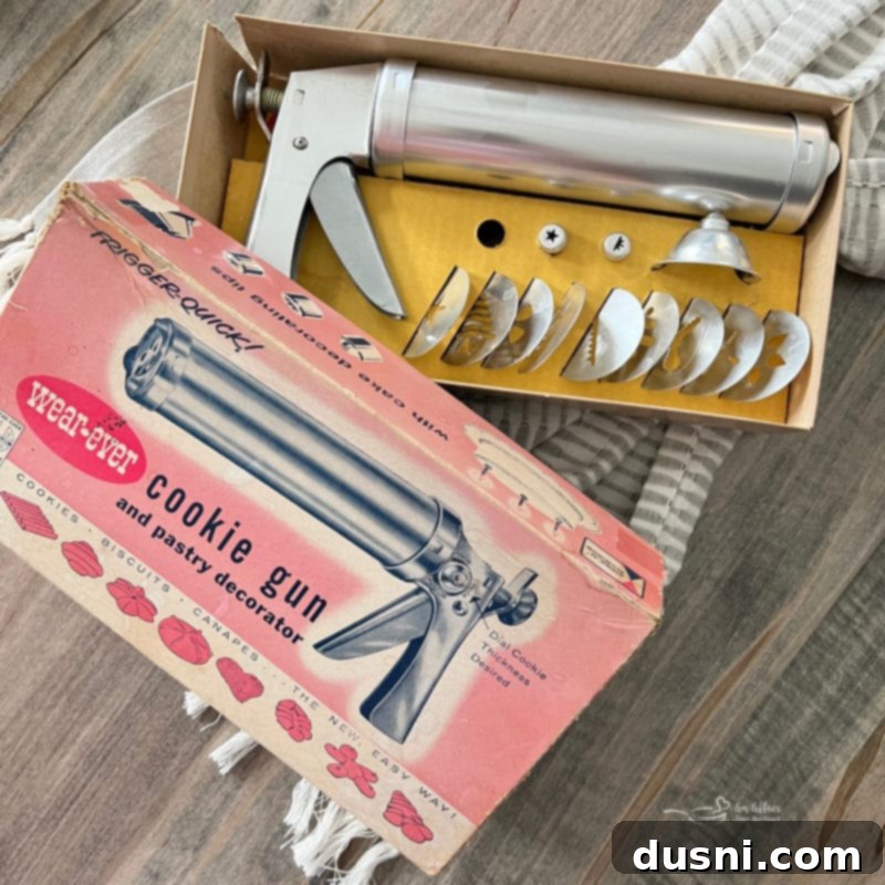 Vintage metal cookie press, essential for perfect spritz cookies