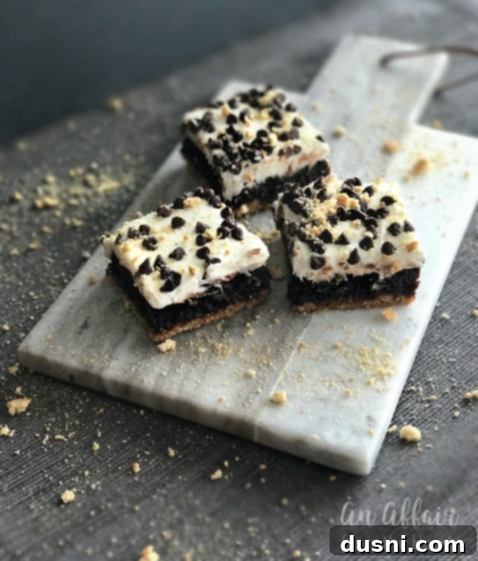 Gooey S'mores Cookie Bars 14 S'mores Brownies on a cutting board