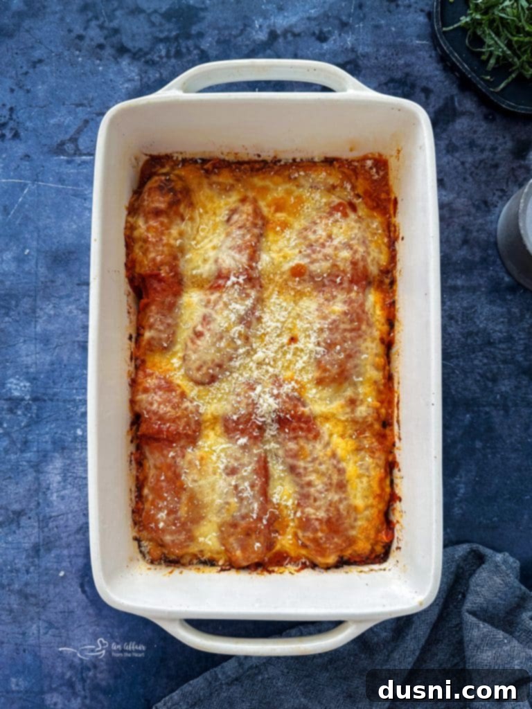 Busy Nights Chicken Parmesan Bake 8 Step 3: Topping chicken parmesan with mozzarella cheese slices.