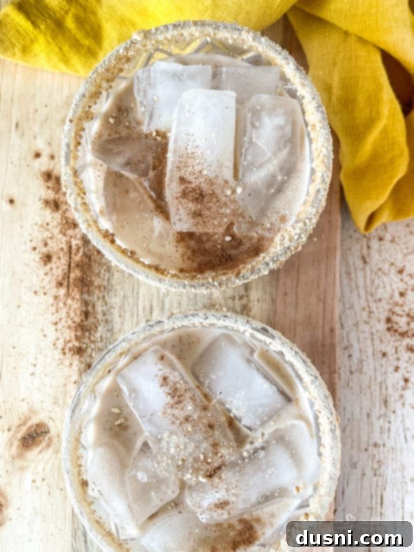 Velvet Pumpkin White Russian 11 A full glass of Pumpkin White Russian cocktail, ready to be enjoyed, showcasing its rich, creamy texture and inviting colors.