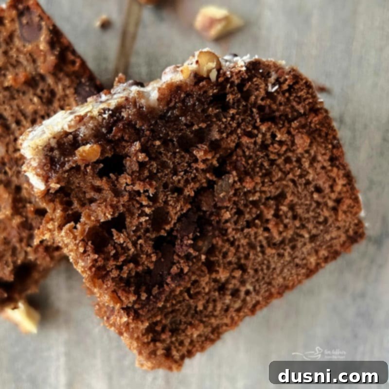 Decadent Bittersweet Chocolate Coffee Cake 15 Bittersweet Chocolate Coffee Cake on a plate with streusel visible