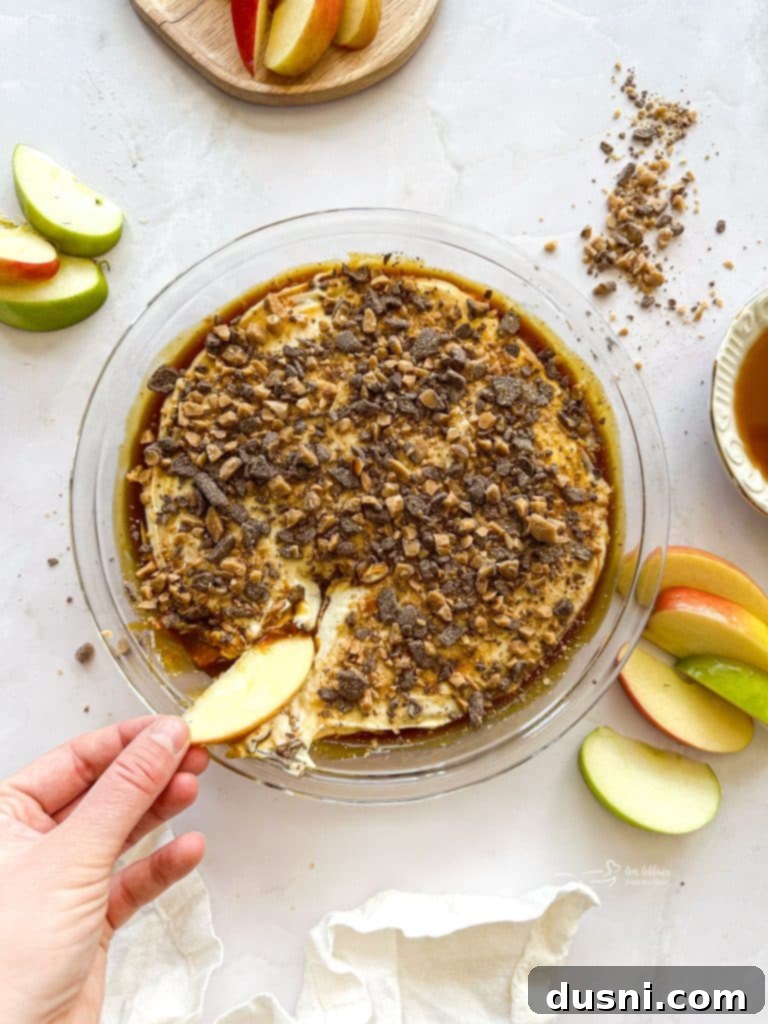 Caramel Apple Dip with a side of apple slices, ready to be served.