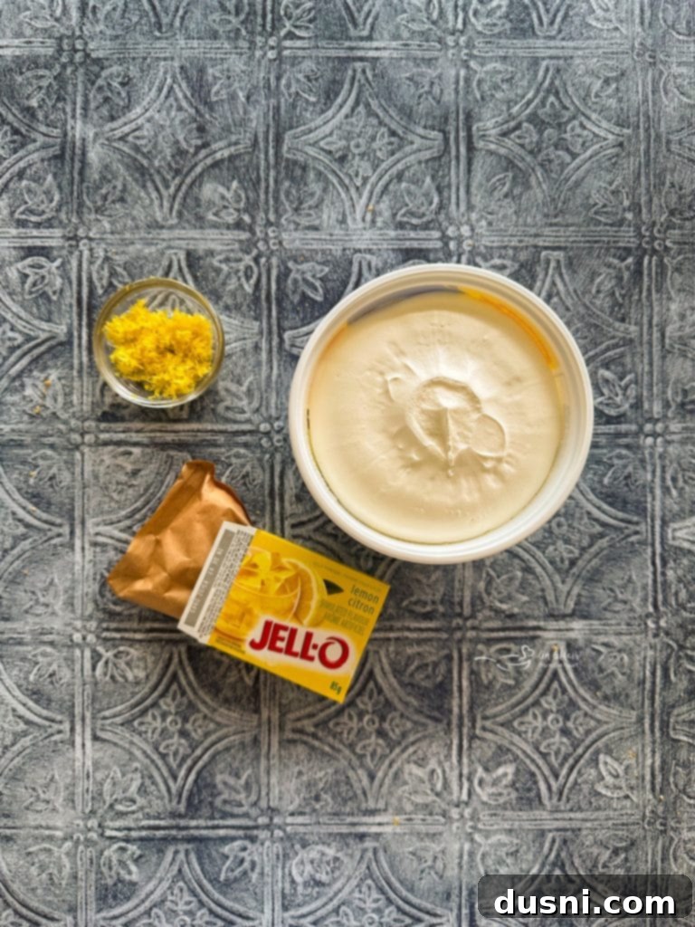 Effortless Lemon Dream Pie 7 A bowl of lemon Jell-O powder next to a box of lemon Jell-O.
