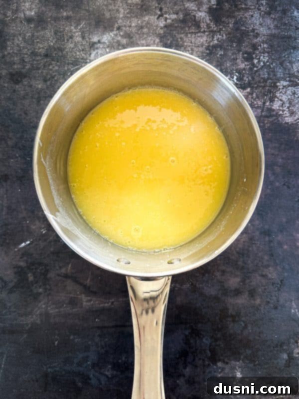 Luxurious White Chocolate Raspberry Truffle Cheesecake 13 Heating half and half with white chocolate