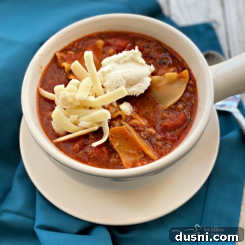 Bowl of Lasagna Soup with a spoon