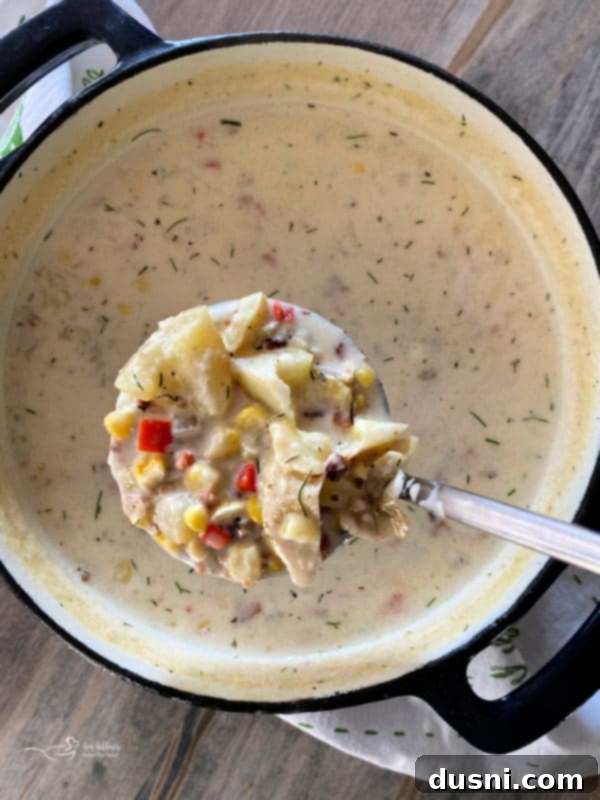 Creamy Sweet Corn & Cheddar Chowder 14 A beautifully presented bowl of Cheesy Potato Corn Chowder.