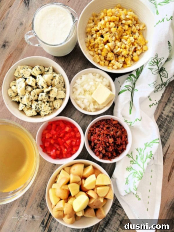 Creamy Sweet Corn & Cheddar Chowder 9 Ingredients for Cheesy Potato Corn Chowder laid out.
