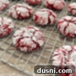 Crimson Velvet Crinkle Cookies 7 crinkle cookies on wire rack