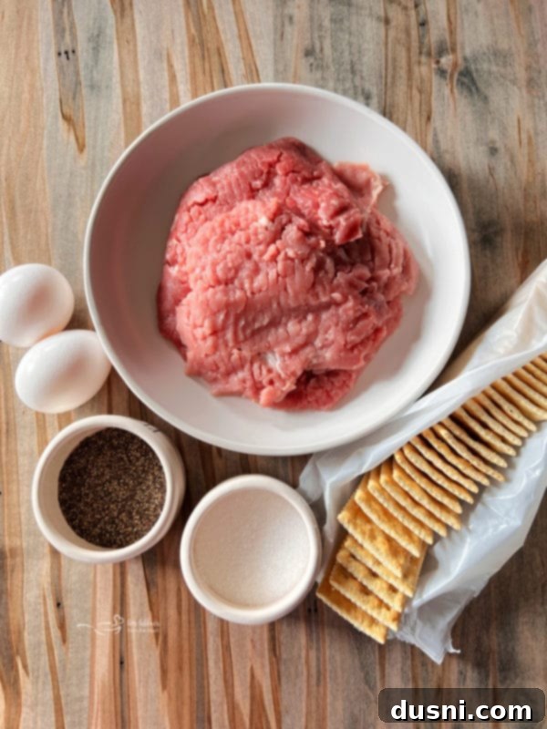Ingredients for breaded pork cutlets: eggs, salt and pepper, pork cutlets, and saltine crackers.