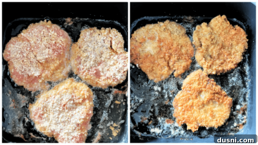 A pork cutlet being pressed into cracker crumbs for breading.