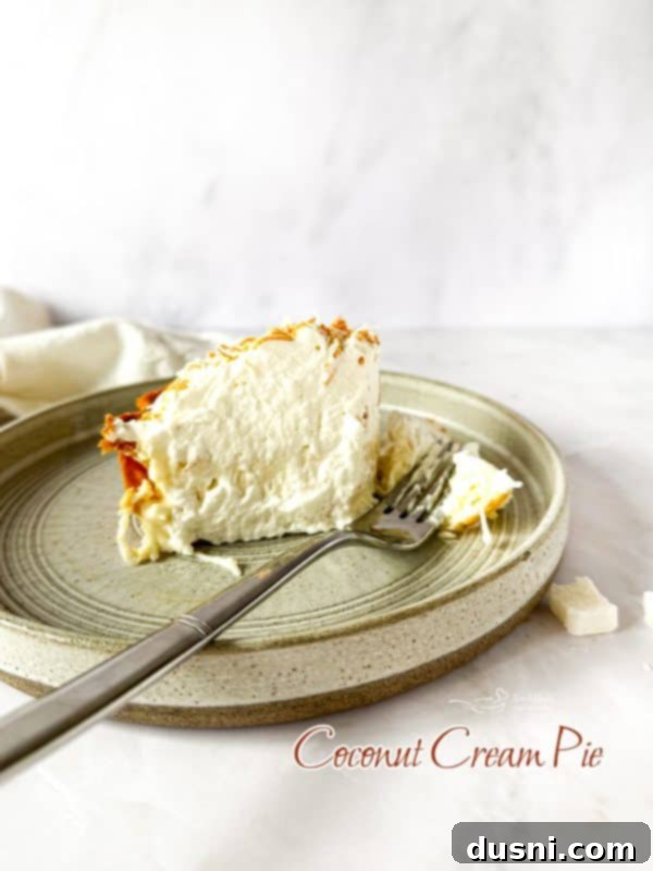 Hero shot of the Homemade Coconut Cream Pie, beautifully garnished and ready to serve