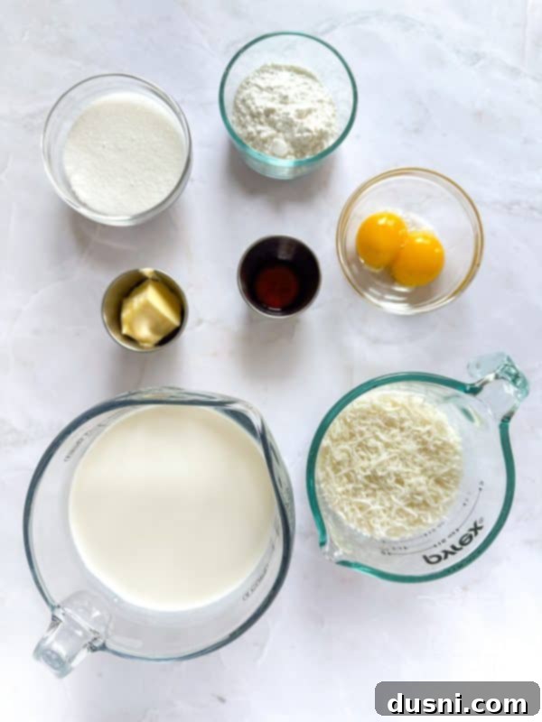 Overhead view of Coconut Cream Pie with whipped topping and toasted coconut flakes