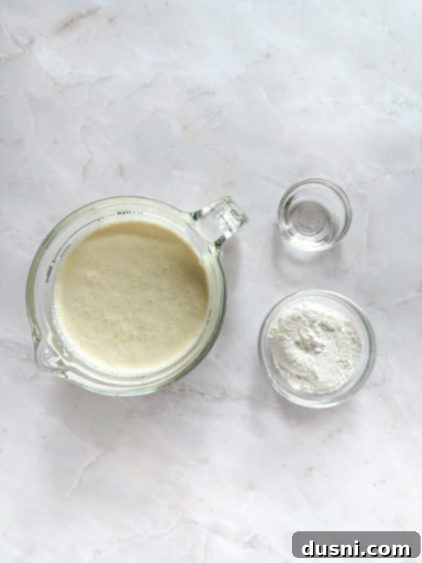Bowl of shredded sweetened coconut flakes, an essential ingredient for the pie