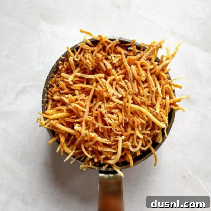 Ingredients for whipped cream topping: heavy whipping cream, powdered sugar, coconut extract