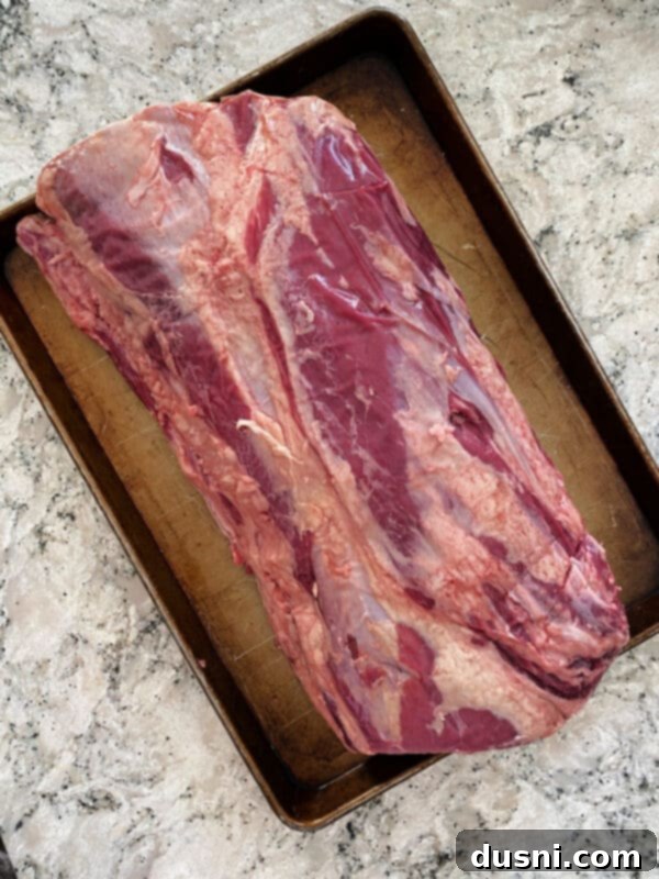 Close-up of a thick slice of perfectly cooked Italian Style Prime Rib Roast