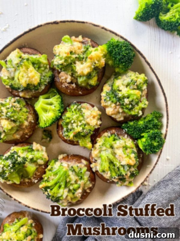 Cheesy Broccoli Stuffed Mushrooms 2 A beautiful plate of broccoli stuffed mushrooms, serving as a tempting hero shot for the recipe.
