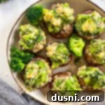 Cheesy Broccoli Stuffed Mushrooms 4 one plate of stuffed mushrooms with cheese and broccoli