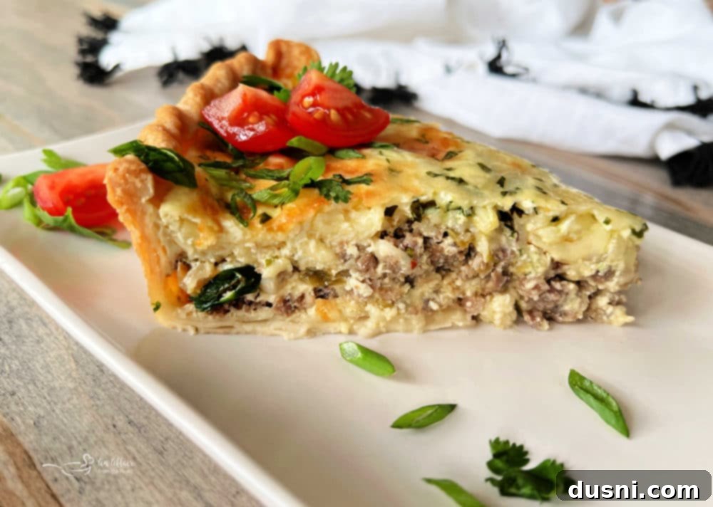 Green Chile Quiche with Sausage slice on a plate