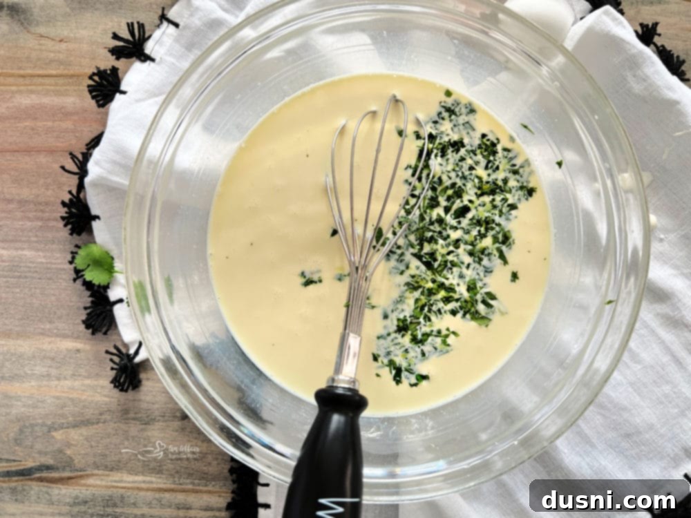 Chopped cilantro added to egg mixture