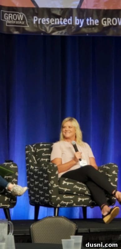 The blogger on stage at the Marketech conference, participating in a panel discussion.