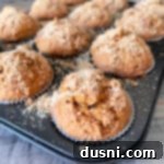 Autumn Spiced Banana Pumpkin Muffins 18 Close up of Pumpkin Spice Banana Muffins in a muffin tin