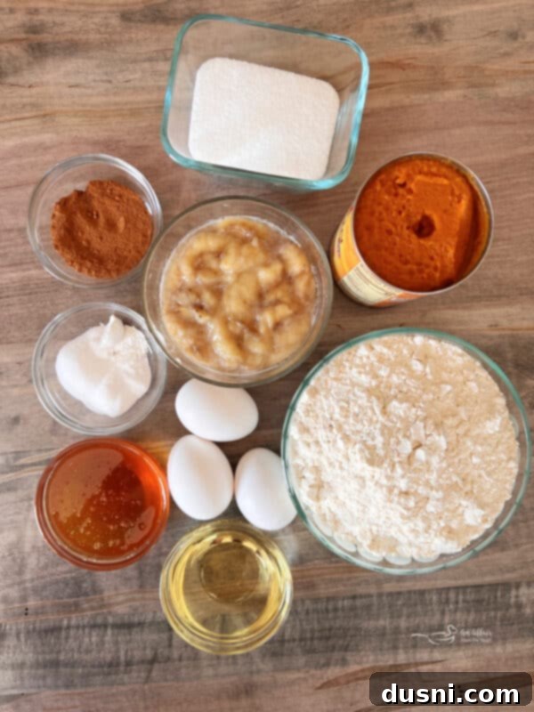 Autumn Spiced Banana Pumpkin Muffins 6 Close-up of streusel ingredients being mixed in a bowl, showing flour, brown sugar, spices, and cold butter pieces.