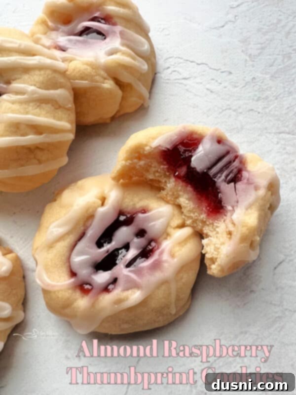 Raspberry Almond Shortbread Jewels 18 Hero image of Almond Raspberry Thumbprint Cookies with 'An Affair from the Heart' branding