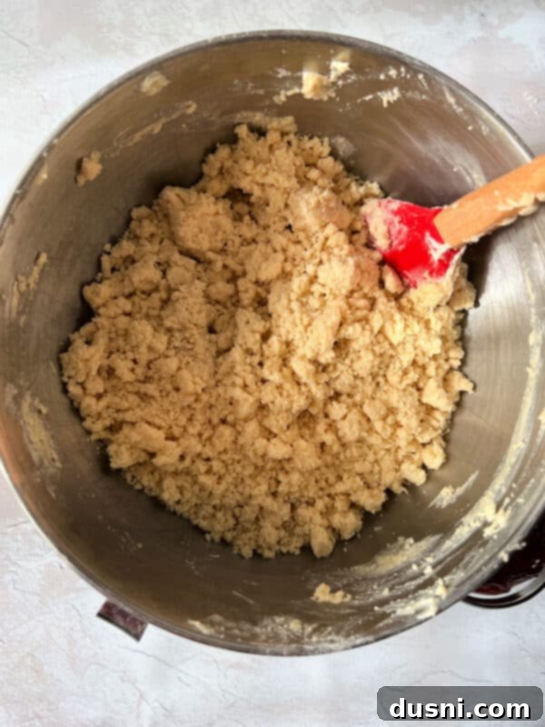 Raspberry Almond Shortbread Jewels 7 Process photo: Creaming butter and granulated sugar together in a mixing bowl