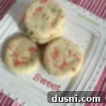 Aunt Vern's Old-Fashioned Sugar Cookies 2 old fashioned sugar cookies on a white plate