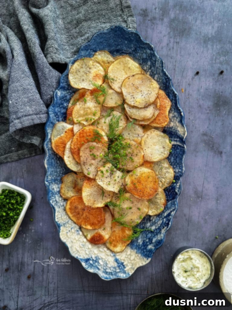 Oven-Fresh Potato Crisps 10 Homemade Baked Potato Chips on a serving platter