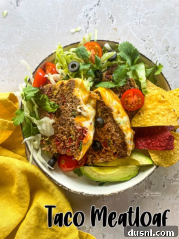 Finished Easy Mexican Meatloaf in a bowl with toppings