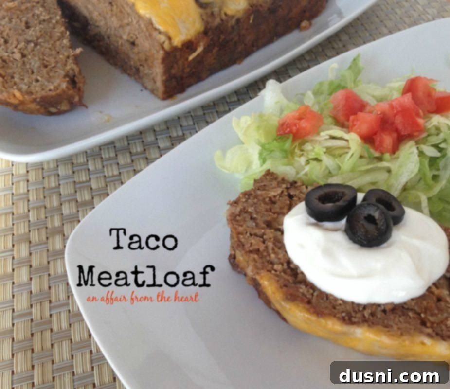 Taco meatloaf with side salad and toppings on a white plate