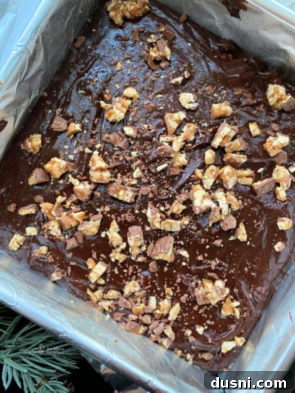 Decadent Candy Bar Fudge 7 hot candy bar fudge in a bake pan