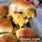 Sunrise Sliders 18 close view of breakfast slider with cheese and parsley