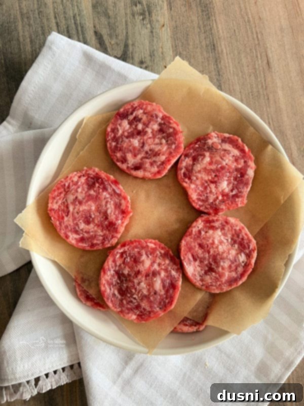 Sunrise Sliders 5 A plate featuring perfectly cooked breakfast sausage patties.