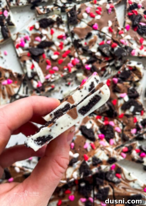 Oreo Bark Candy oreo cookie bark in hand