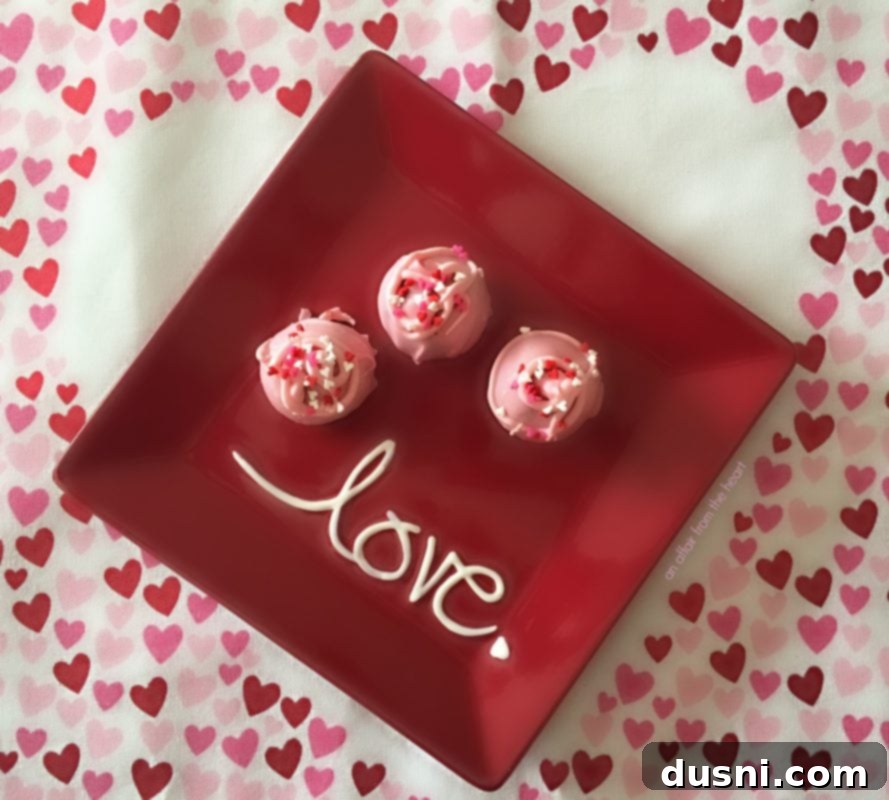 Midnight Oreo Crunch 5 Oreo Truffles on a red plate that says love